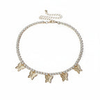 Necklace with butterfly charms and rhinestones on a white background