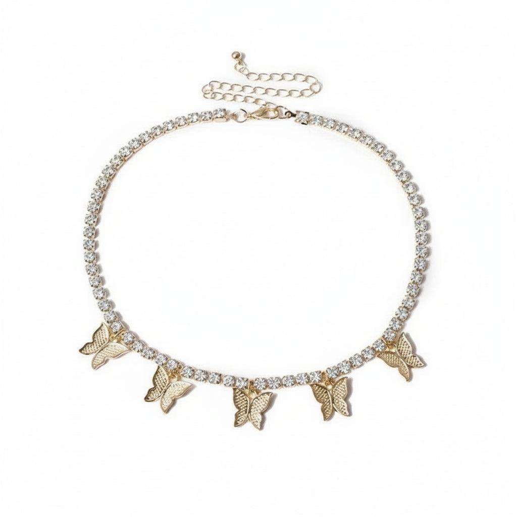 Necklace with butterfly charms and rhinestones on a white background