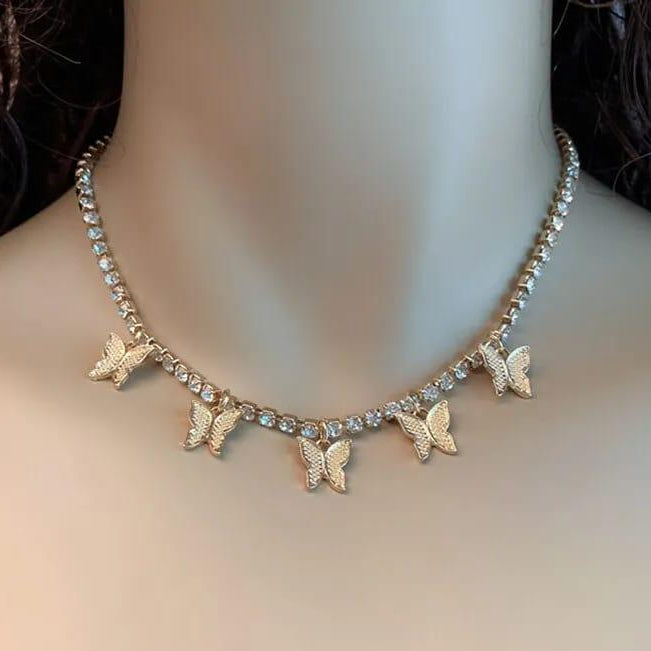 Tennis Cubic Zircon Necklace with butterfly pendants on a woman's neck
