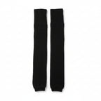 Pair of black leg warmers on a white background