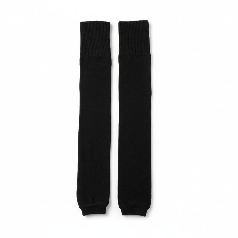 Pair of black leg warmers on a white background