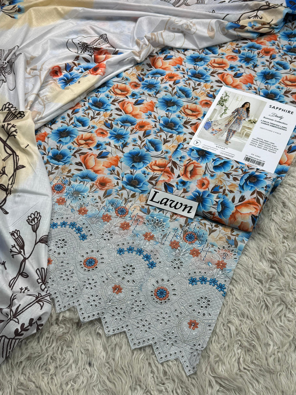 Sapphire Bloom Lawn 3PC Unstitched Suit – Summer Festive Collection