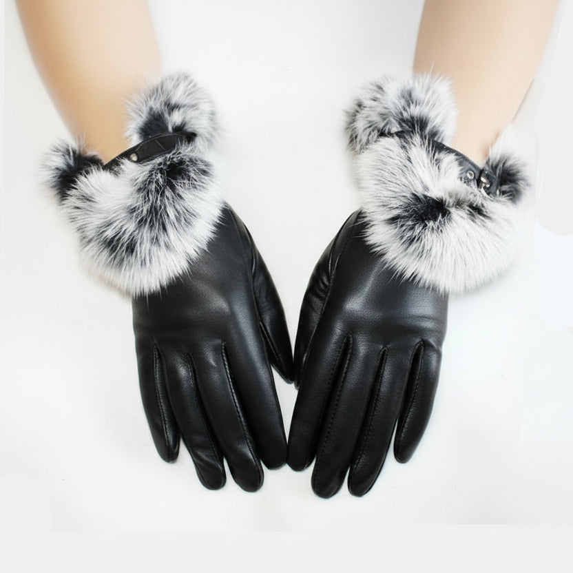 Black leather gloves with fur cuffs on a white background